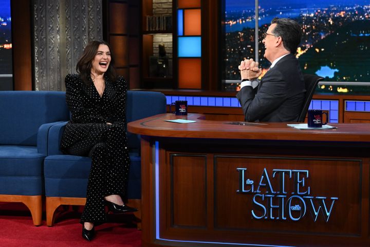 Weisz and Colbert laugh during their conversation on "The Late Show."