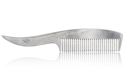 A silver moustache comb from Tiffany and Co owned by Mercury.