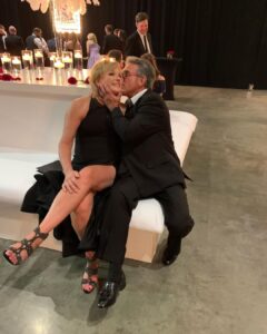 Larry Edwards planted a kiss on his wife Jen Edwards