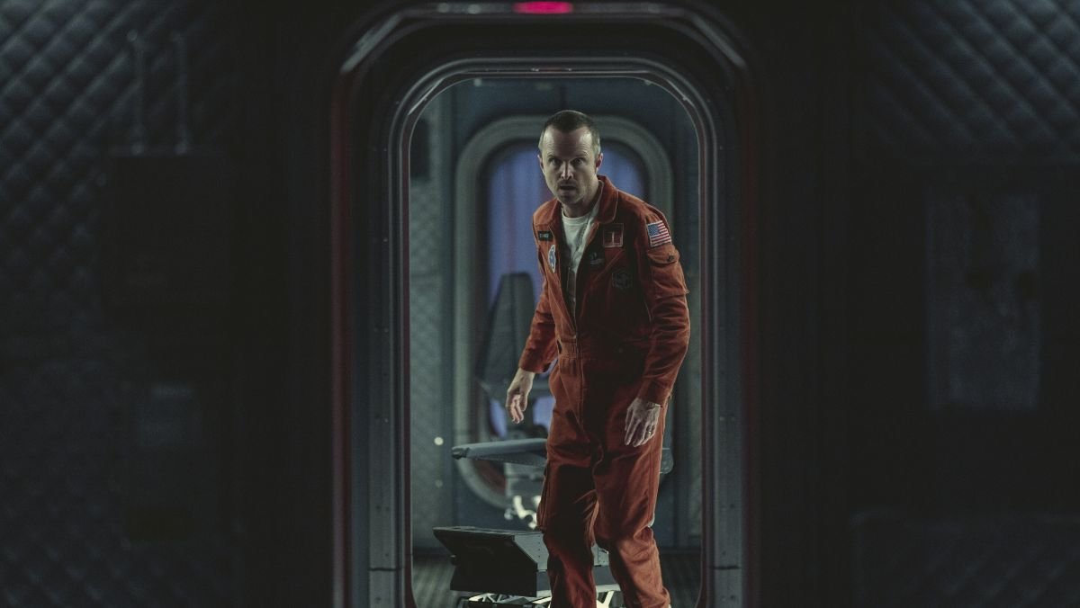 Aaron Paul stands on a spaceship in Black Mirror season six trailer