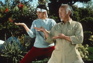 THE KARATE KID, PART III, from left: Ralph Macchio, Pat Morita, 1989. Columbia Pictures / Courtesy Everett Collection