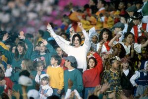 Michael Jackson performing with children at the 1993 Super Bowl.