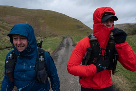 Walkers and regular visitors to the area Jason Seymour (left) and Darren Collins (right) in anoraks making their way up the Upper Coquet valley as they train for a 50-mile hike.