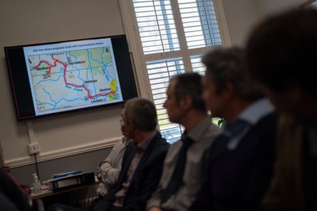 The proposed route of power lines is displayed on a map at Northumberland national park offices during the meeting with national park members to decide the potential future of the Upper Coquet valley and its chance of getting mains electricity.
