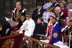 Prince Louis, age 5, yawns during the coronation ceremony of King Charles III in Westminster Abbey.