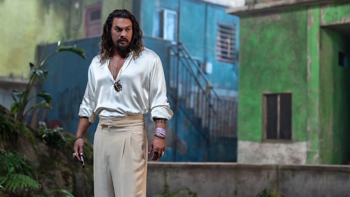 Jason Mamoa in a white shirt and jewelry in Fast X