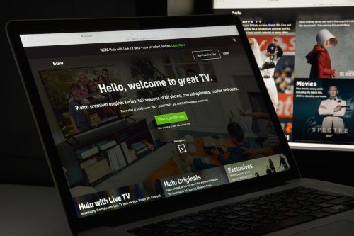 A laptop showing the Hulu website homepage