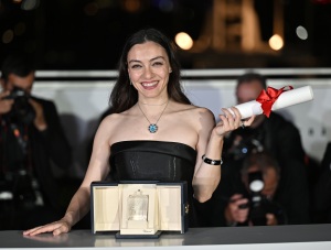 Turkish actress Merve Dizdar after winning the Best Actress Prize for her part in the film "Kuru Otlar Ustune" (About Dry Grasses)