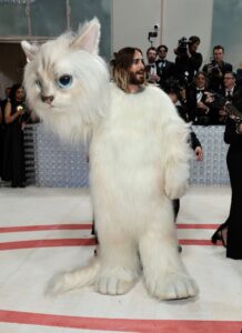 Jared Leto reveals its him in the cat suit at the Met Gala on Monday.