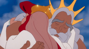 King Triton embracing Ariel on her wedding day in the 1989 animated Little Mermaid