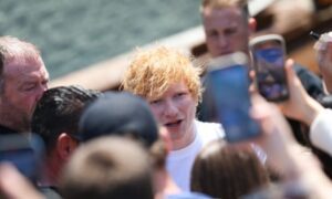 ‘I’m speccy, ginger hair, really short, English. That guy doesn’t become a pop star’ … Sheeran surrounded by fans in Los Angeles, May 2023.