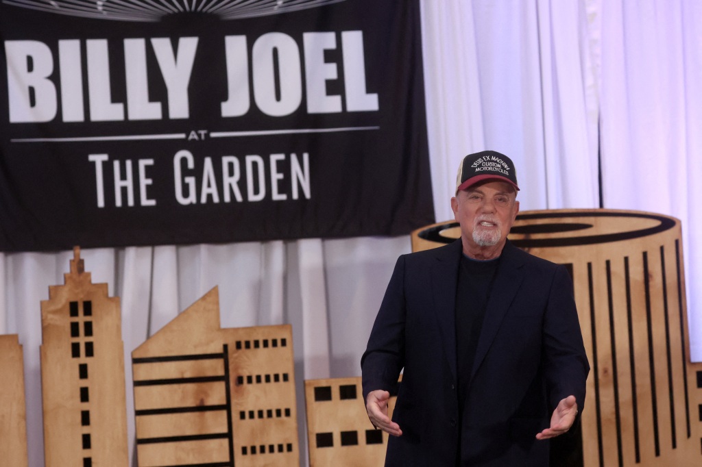 Billy Joel poses for photographers during the announcement to end his performance residency at Madison Square Garden