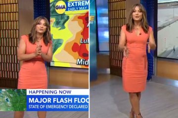 GMA's Ginger shows off fit figure in skintight orange dress on live TV