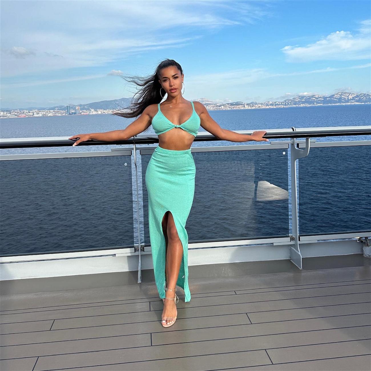 Izzy Fairthorne In Bikini Top Cruises Through France