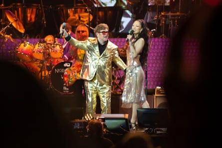 Elton John performs with Rina Sawayama.