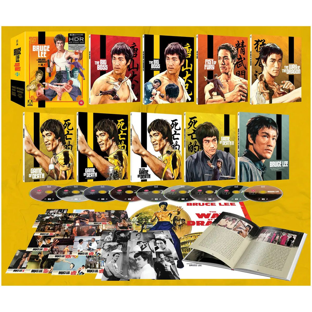 A box set of Bruce Lee films presented by Arrow UK. A large box contains lots of smaller boxes, discs, art, a book, and a poster.