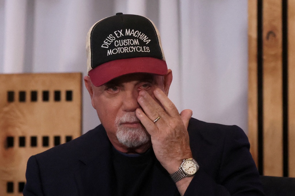 Billy Joel wipes tears during the announcement to end his performance residency at Madison Square Garden