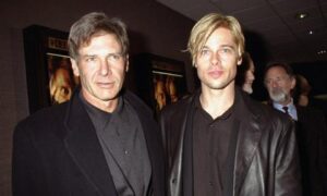 Harrison Ford and Brad Pitt attending premiere of "The Devil