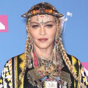 Madonna postpones tour after stay in ICU - Music News