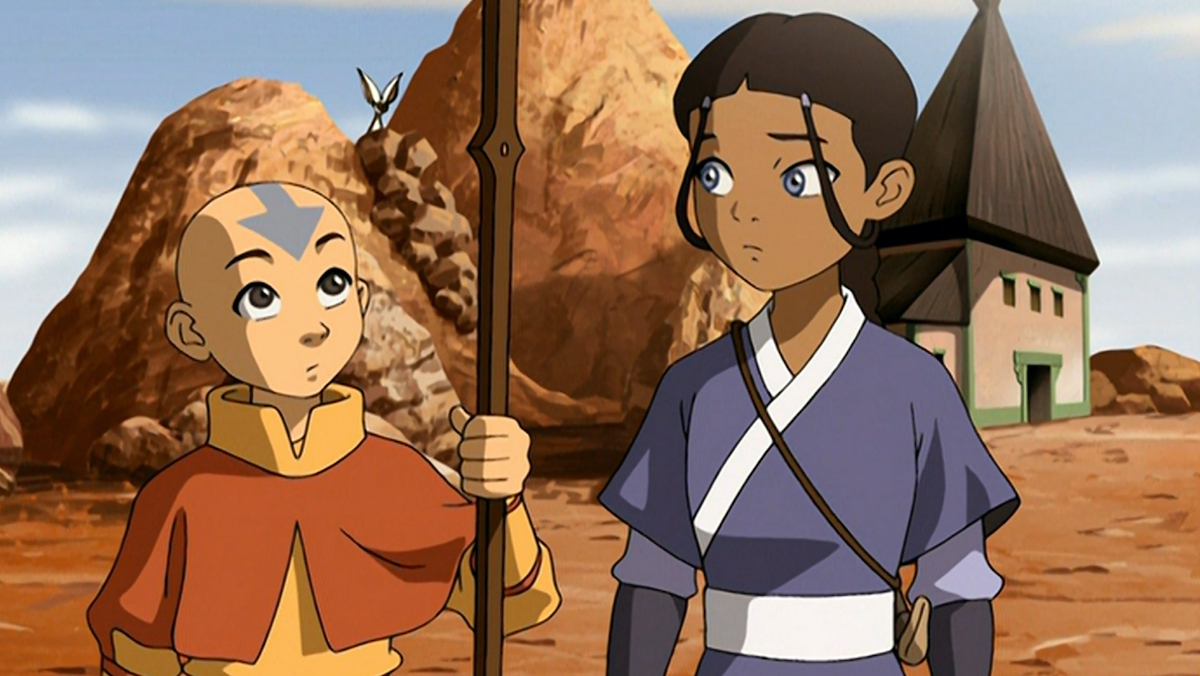 Aang and Katara stand in a rocky town in Avatar: The Last Airbender.