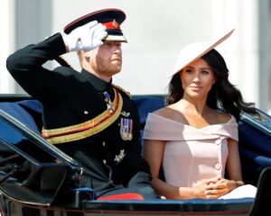 LONDON, UNITED KINGDOM - JUNE 09: (EMBARGOED FOR PUBLICATION IN UK NEWSPAPERS UNTIL 24 HOURS AFTER CREATE DATE AND TIME) Prince Harry, Duke of Sussex and Meghan, Duchess of Sussex travel down The Mall in a horse drawn carriage during Trooping The Colour 2018 on June 9, 2018 in London, England. The annual ceremony involving over 1400 guardsmen and cavalry, is believed to have first been performed during the reign of King Charles II. The parade marks the official birthday of the Sovereign, even though the Queen's actual birthday is on April 21st. (Photo by Max Mumby/Indigo/Getty Images)