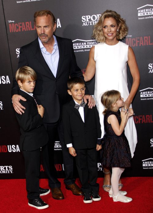 Kevin Costner, Christine Baumgartner, and their children at the premiere of 