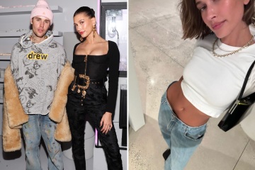 Hailey shows off her flat stomach as she wears husband Justin's baggy jeans