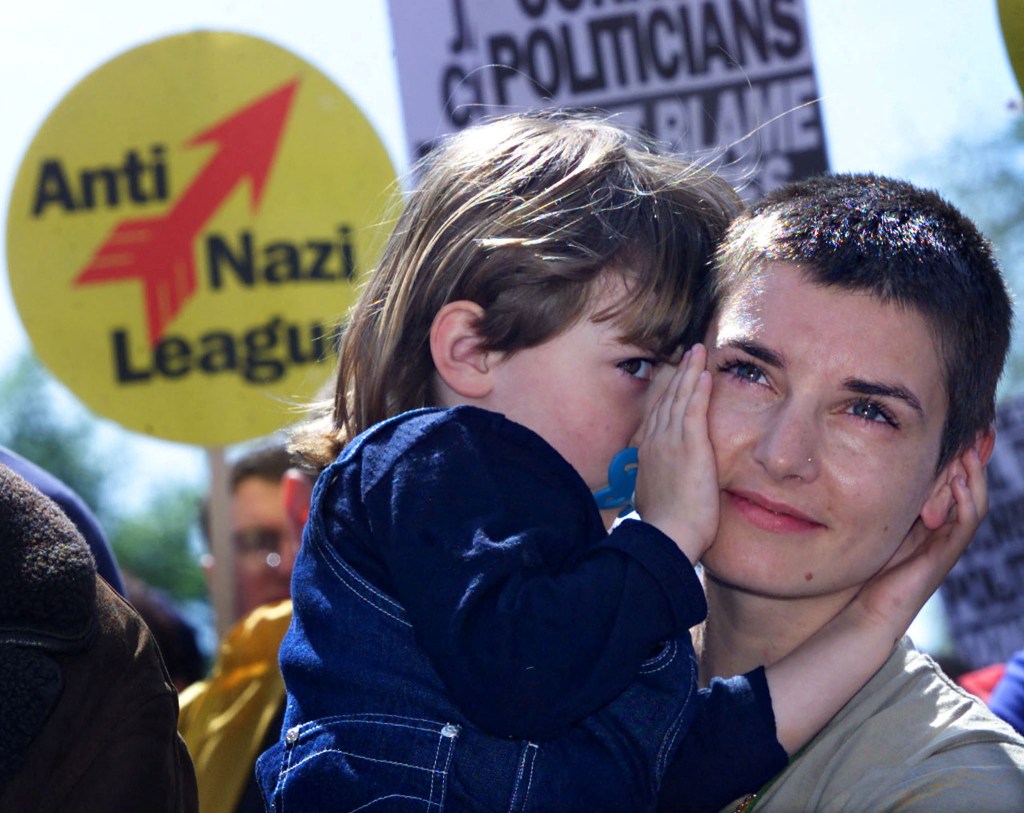 The Irish singer Sinead O'Connor with young daughter Roisin at a protest in 2000.