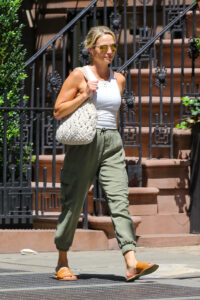 Amy showed off her fit figure for a weekend walk in West Village