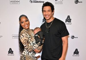 Keke Palmer (left) and Darius Jackson are pictured with their son on April 29 in Atlanta.