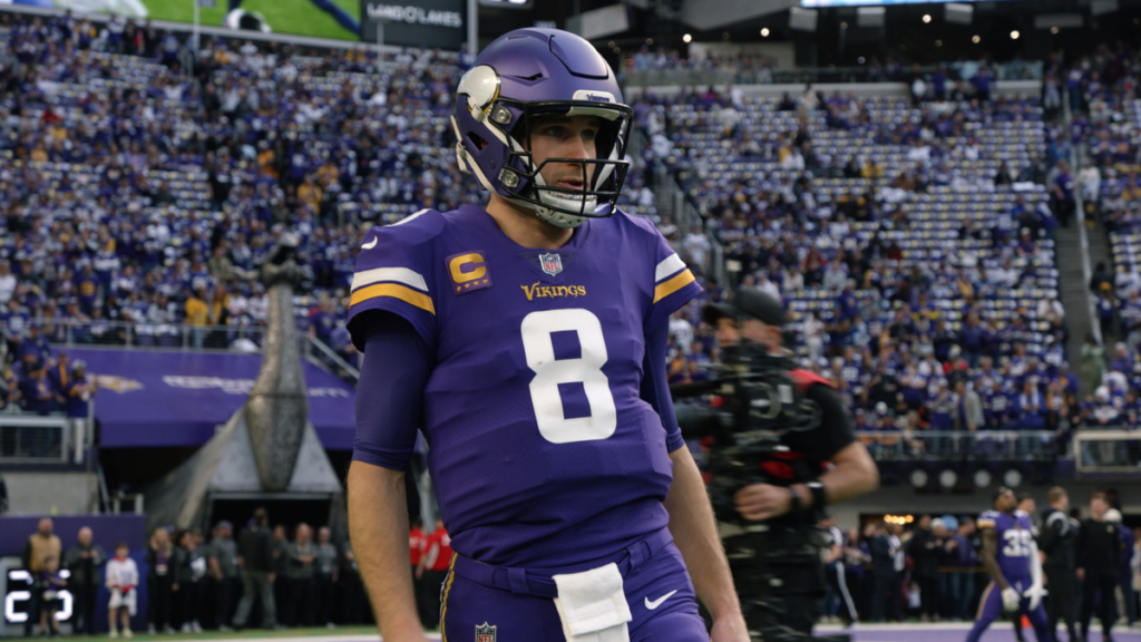 Kirk Cousins standing on a football field wearing his Minnesota Vikings uniform in Netflix’s Quarterback