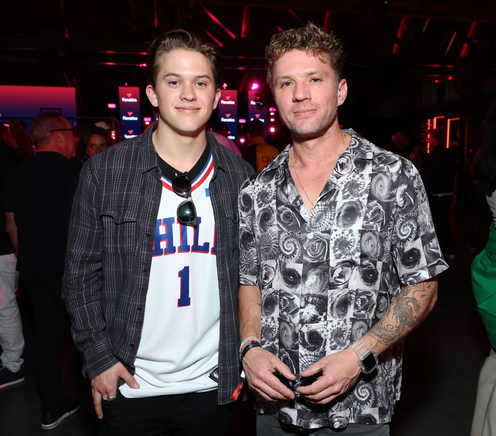 Deacon poses with father Ryan Phillippe.