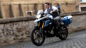 Tom Cruise as Ethan Hunt riding a stolen motorcycle in Mission: Impossible - Dead reckoning Part One