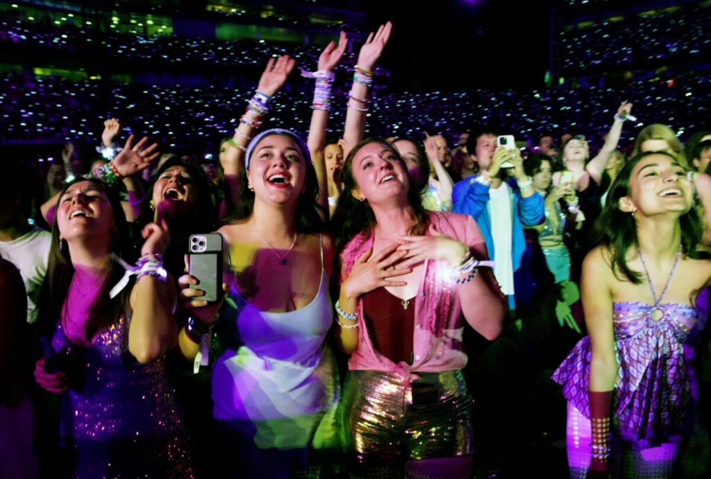 A gaggle of fans at a Taylor Swift concert