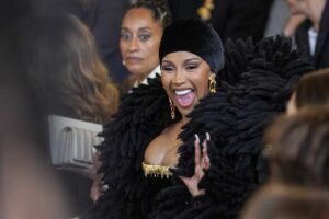 Cardi B throws a microphone at a fan who threw a drink at her : NPR