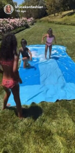 True Thompson and her cousins did some slipping and sliding in the backyard