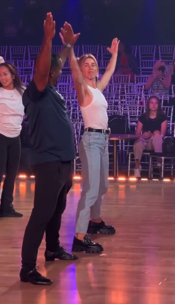 The new Dancing with the Stars host gave a before-and-after look at the cast rehearsing before Tuesday night's live show