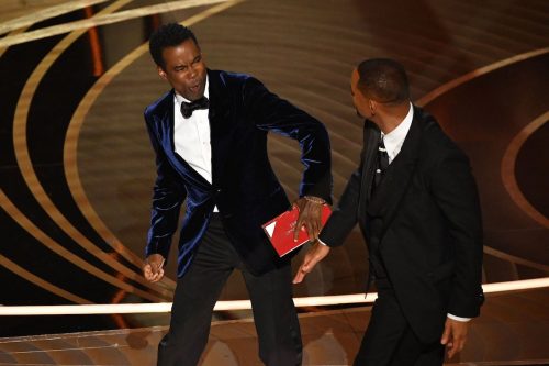 Will Smith slapping Chris Rock at the 2022 Oscars