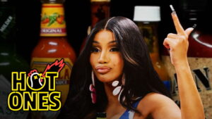Cardi B Tries Not to Panic While Eating Spicy Wings