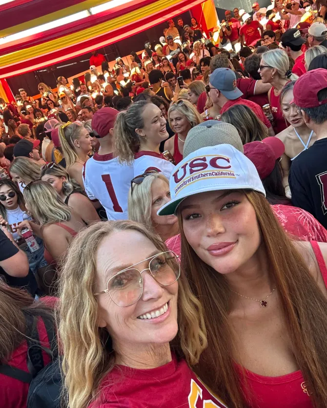Isabella's mom joined her for a football game