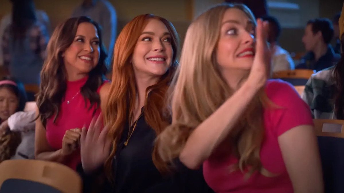 The cast of Mean Girls waving in a commercial for Walmart
