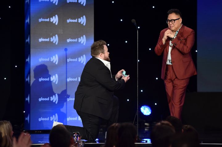 In 2022, Smith (left) surprised Santos with an onstage proposal at the GLAAD Media Awards in Los Angeles. 