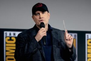 Kevin Feige talking into a microphone at San Diego Comic-Con