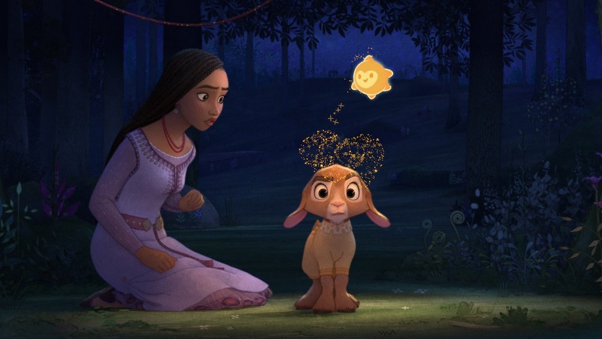 Asha looks at a magical star floating above a goat in Disney's Wish