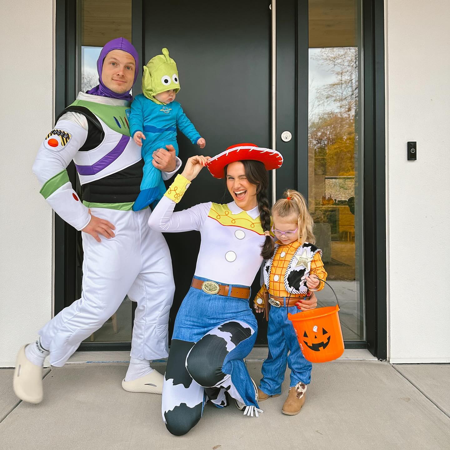 Abbie Herbert poses for a Halloween photo with her husband Josh Herbert, daughter Poppy, and son Jagger