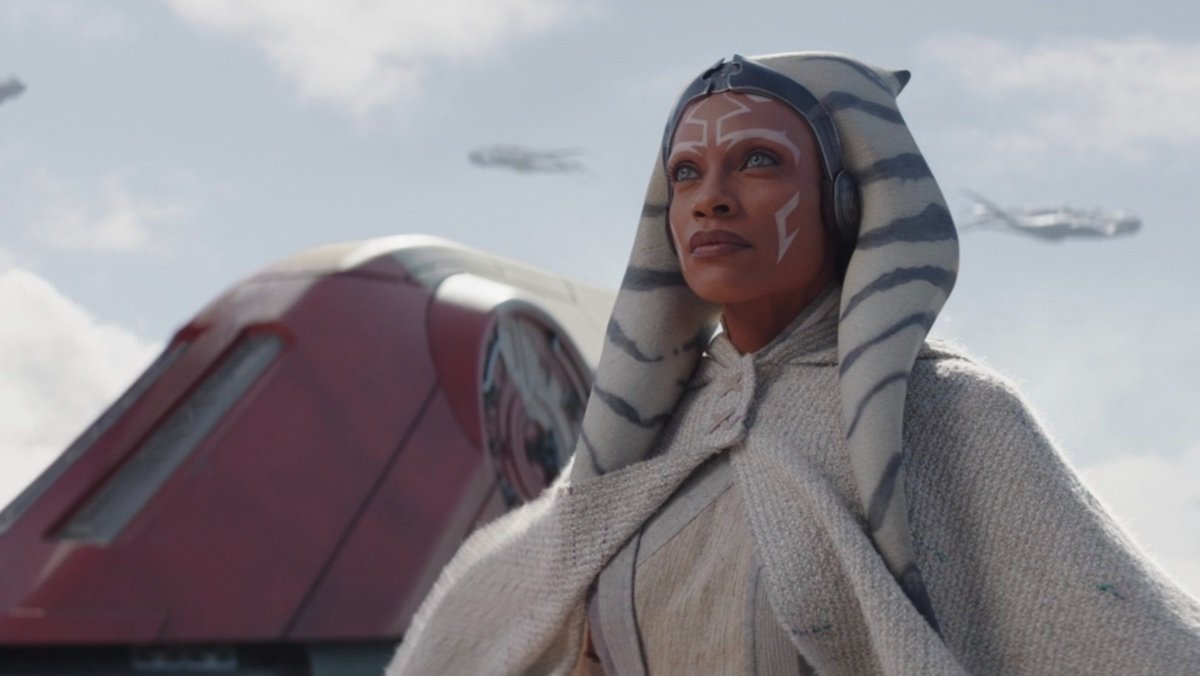Ahsoka in all white stands outside a ship with purrgil flying around. Dave Filoni oversees this Star Wars project.