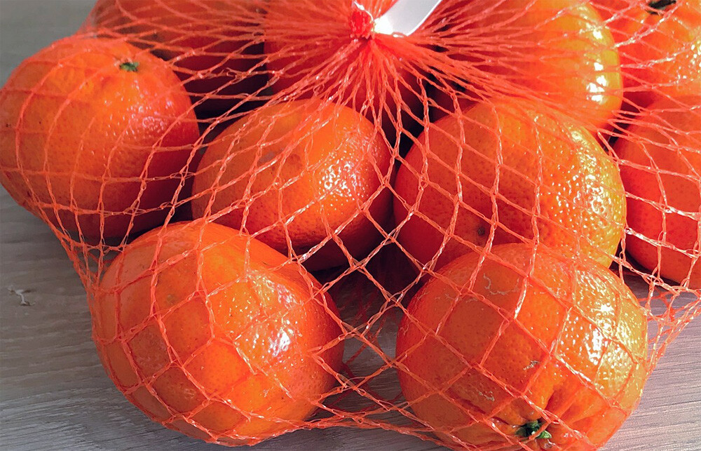 Mandarin oranges in mesh bag