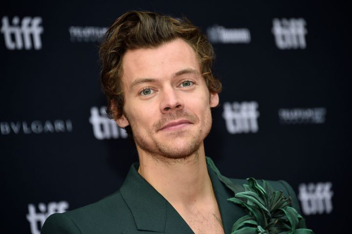 Harry Styles, seen here with a previous hairstyle, recently attended a U2 concert with a buzz cut.