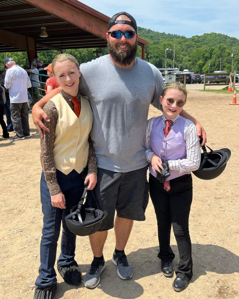 Corey Simms pictured with twin daughters Ali and Aleeah