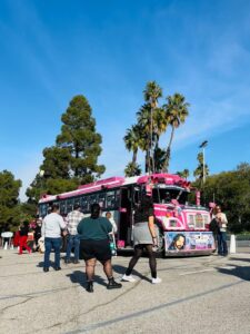 Fans approach the pink El Buki bus
